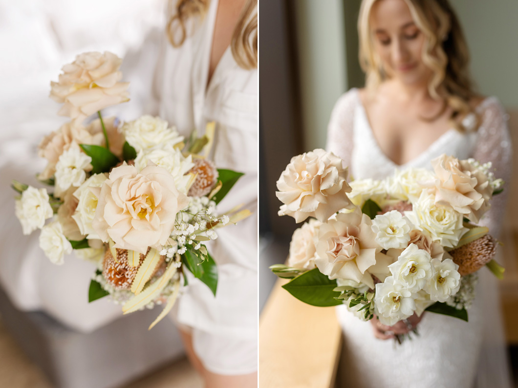 Bride holding a soft blush bouquet with roses, carnations, and native textures, photographed indoors.
